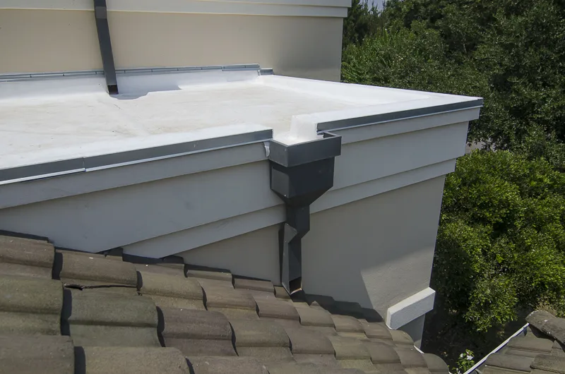 Finished TPO roofing upgrade near scuppers Lake Travis Freetail Roofing