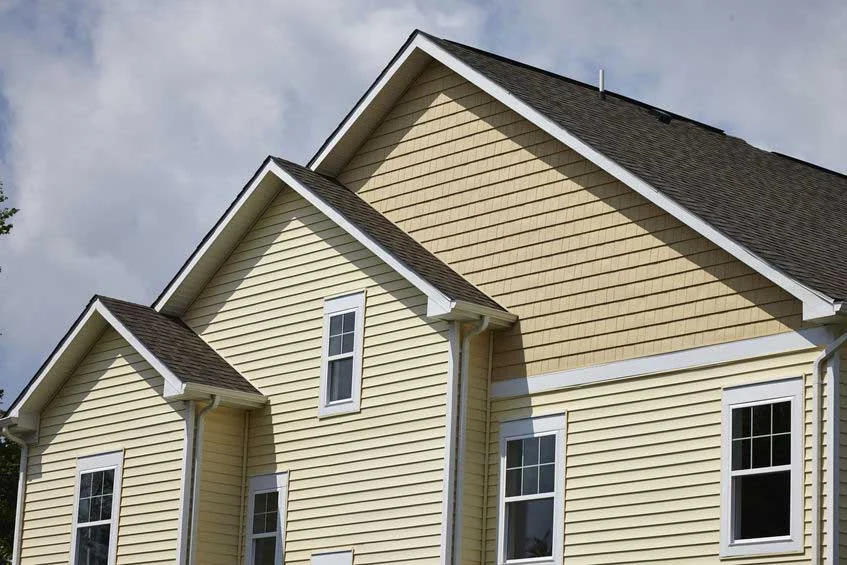 Home With New Siding in Austin, TX | Freetail Roofing | free roof inspections near me