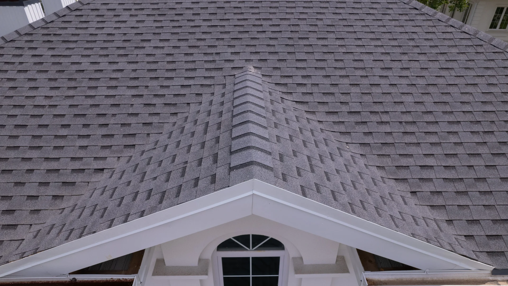 First Rate Roofing Services Sunset Valley Freetail Roofing Angled overhead view of a gabled section of a new asphalt shingle roof
