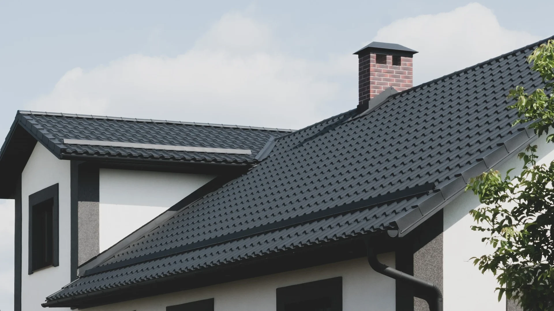 Angled view of a flawless tile installation on a large, residential building