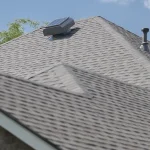 View of multiple sections of a newly done asphalt shingle roof