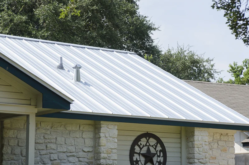 Brick home with new standing seam metal roof