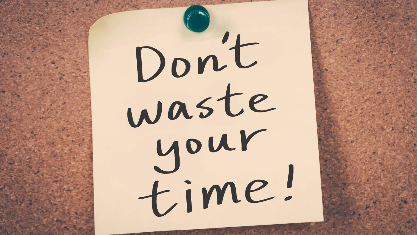 Reliable Roof Replacement Services | Austin, TX | Freetail Roofing A note that reads “Don’t waste your time” is pinned to a corkboard.