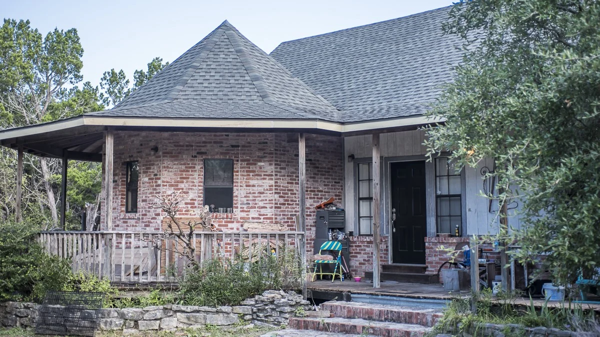 Beautiful brick home with Charcoal Timberline Shingles