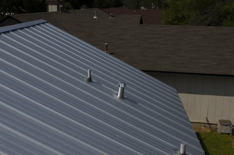 Strong Commercial Roof Repair In Liberty Hill, TX | Freetail Roofing Beautiful standing seam metal roof on building