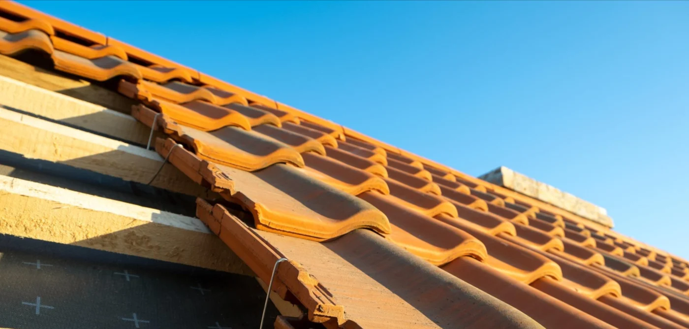 Residential Roof Replacement | Burnet, TX | Freetail Roofing Close-up on a tile roof mid-installation in Burnet,TX | Freetail Roofing